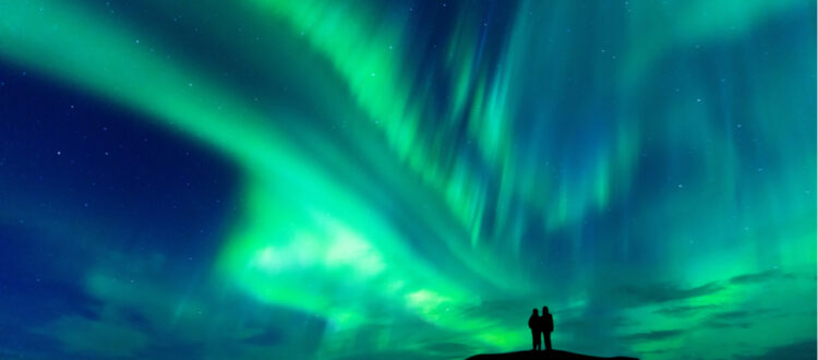 couple watching the Northern Lights